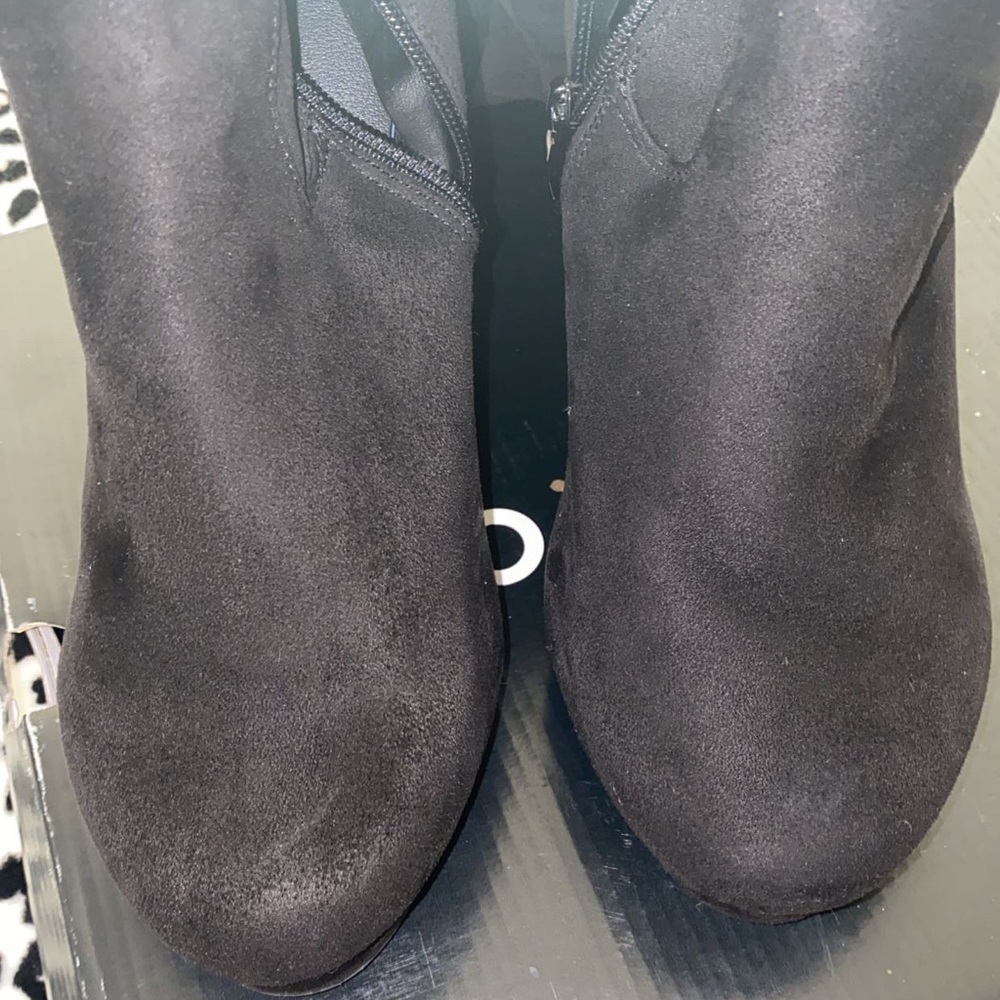 Over the knee high heeled boots